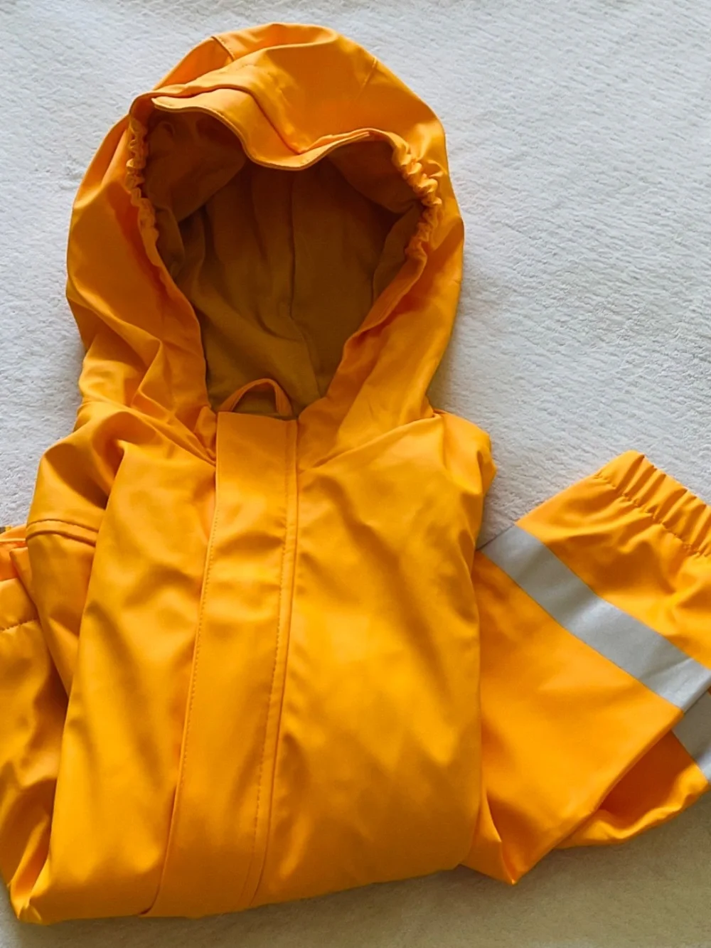 CAT & JACK Waterproof rain jacket with hood and reflective bands,